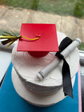 Red Graduation Cap and Diploma