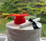 Red Graduation Cap and Diploma